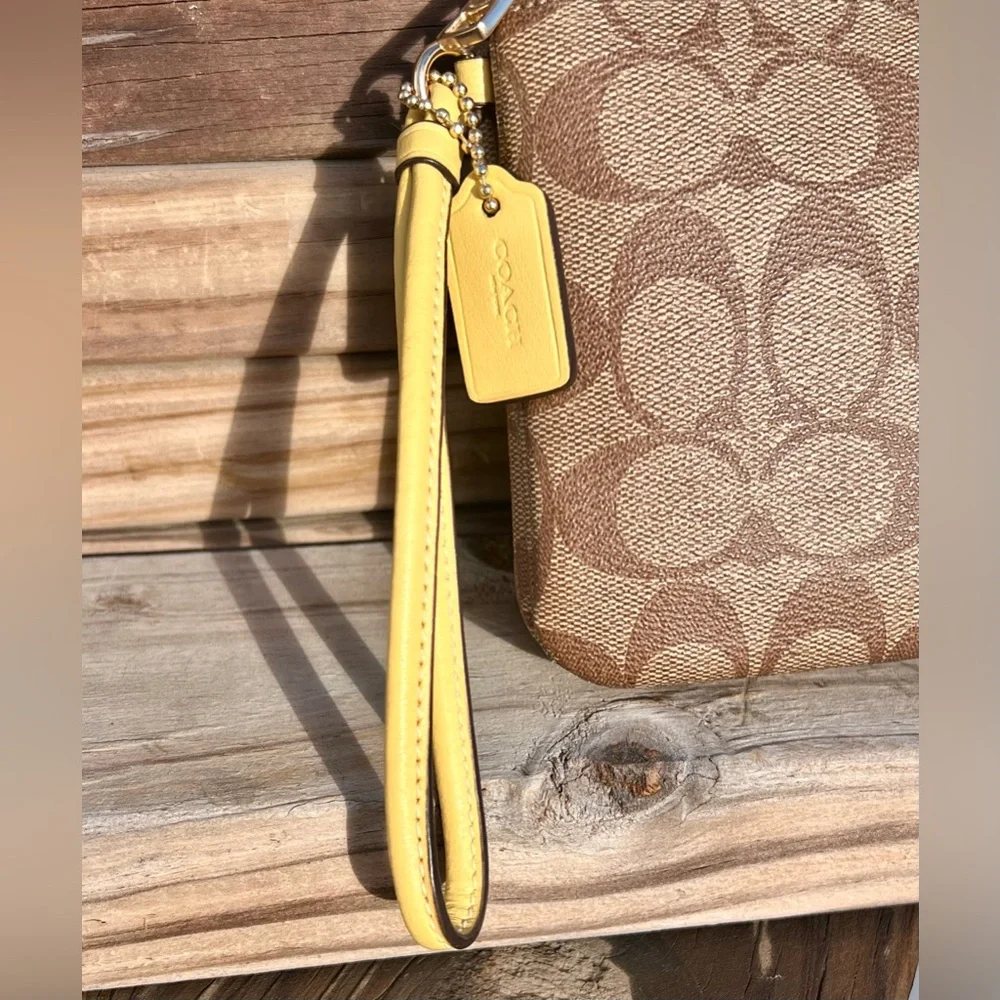 - Coach Double Sided Yellow Leather Wristlet! EUC!!